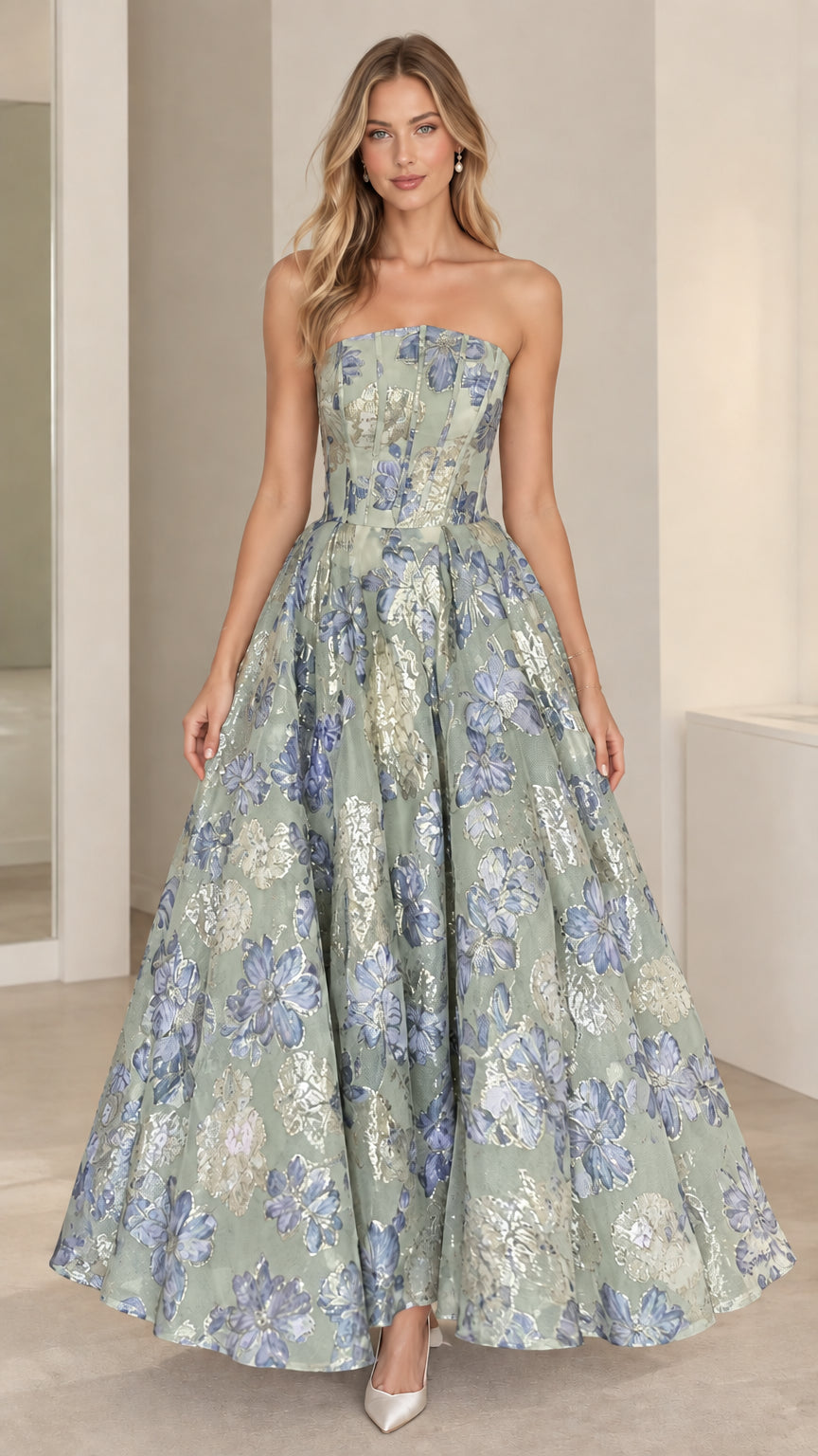 Full-length view of sage green floral jacquard strapless evening dress