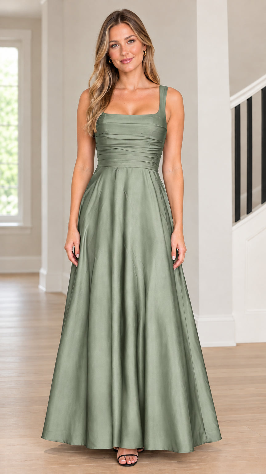 Model wearing sage green square neck pleated bodice satin A-line maxi dress front view
