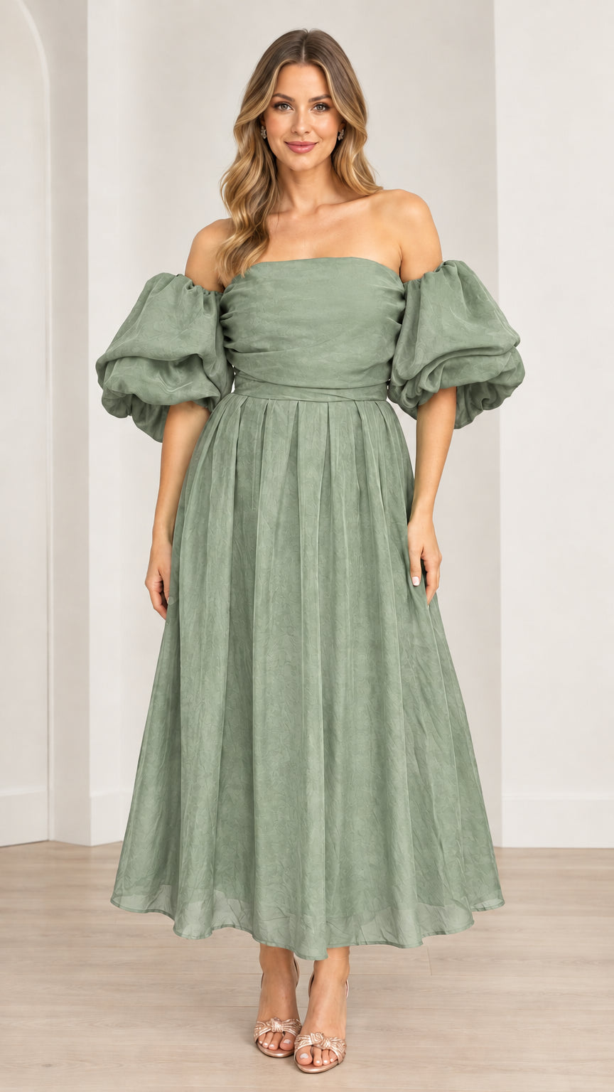 Model wearing off-the-shoulder puff sleeve pleated midi dress in sage green