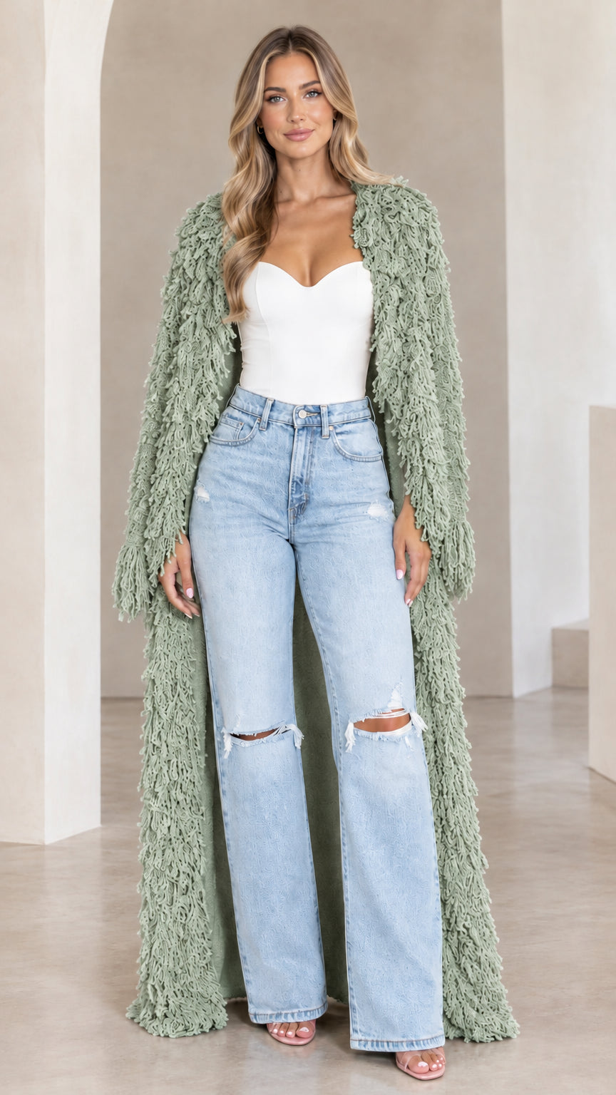 Front view of model wearing sage green textured shaggy maxi duster cardigan