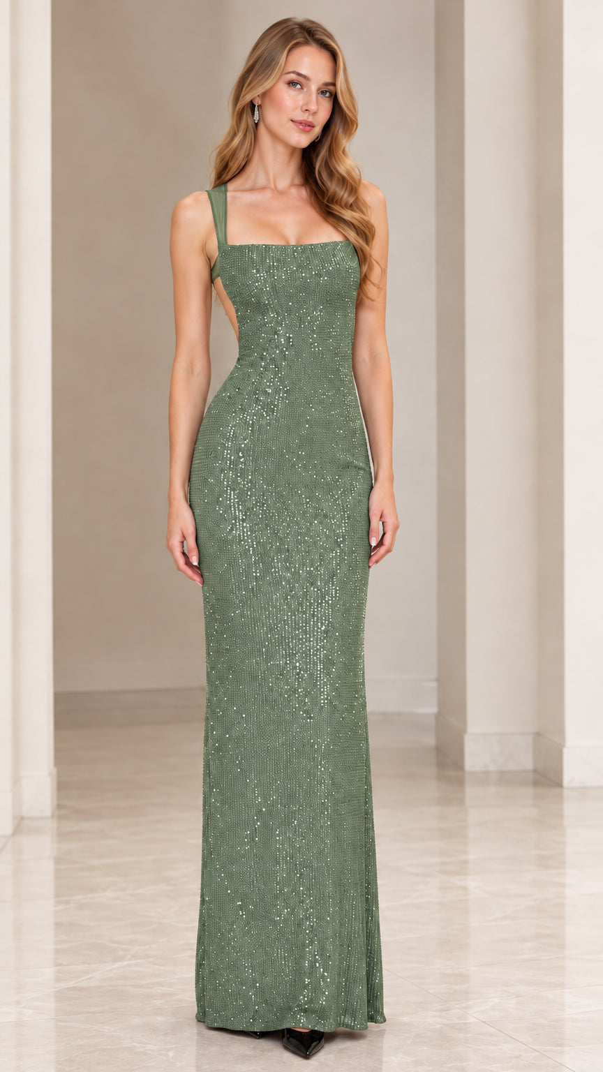 Full front view of model wearing sage green sequin open back evening dress