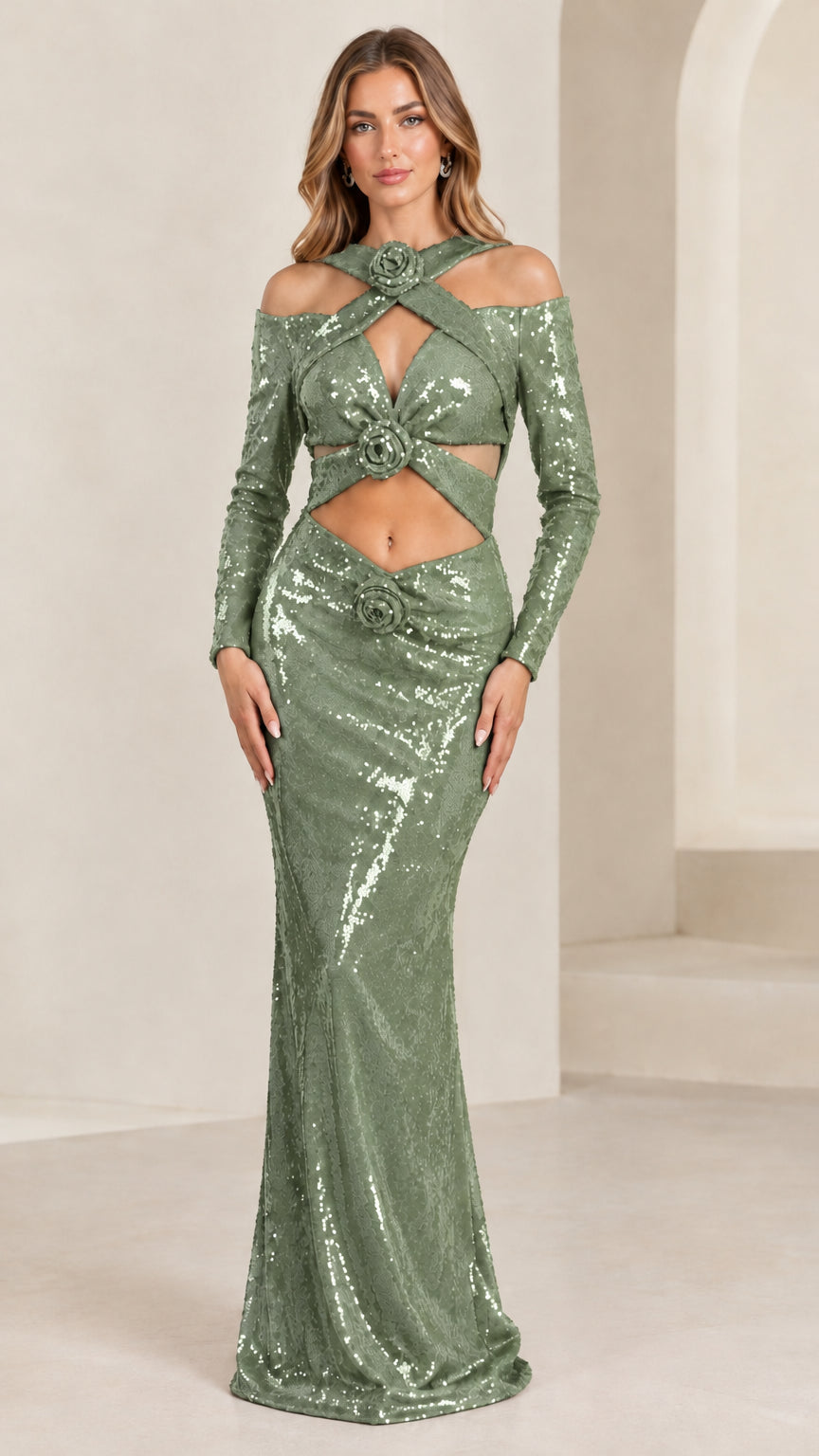 Front view of sage green sequin cutout evening gown with long sleeves and rosettes
