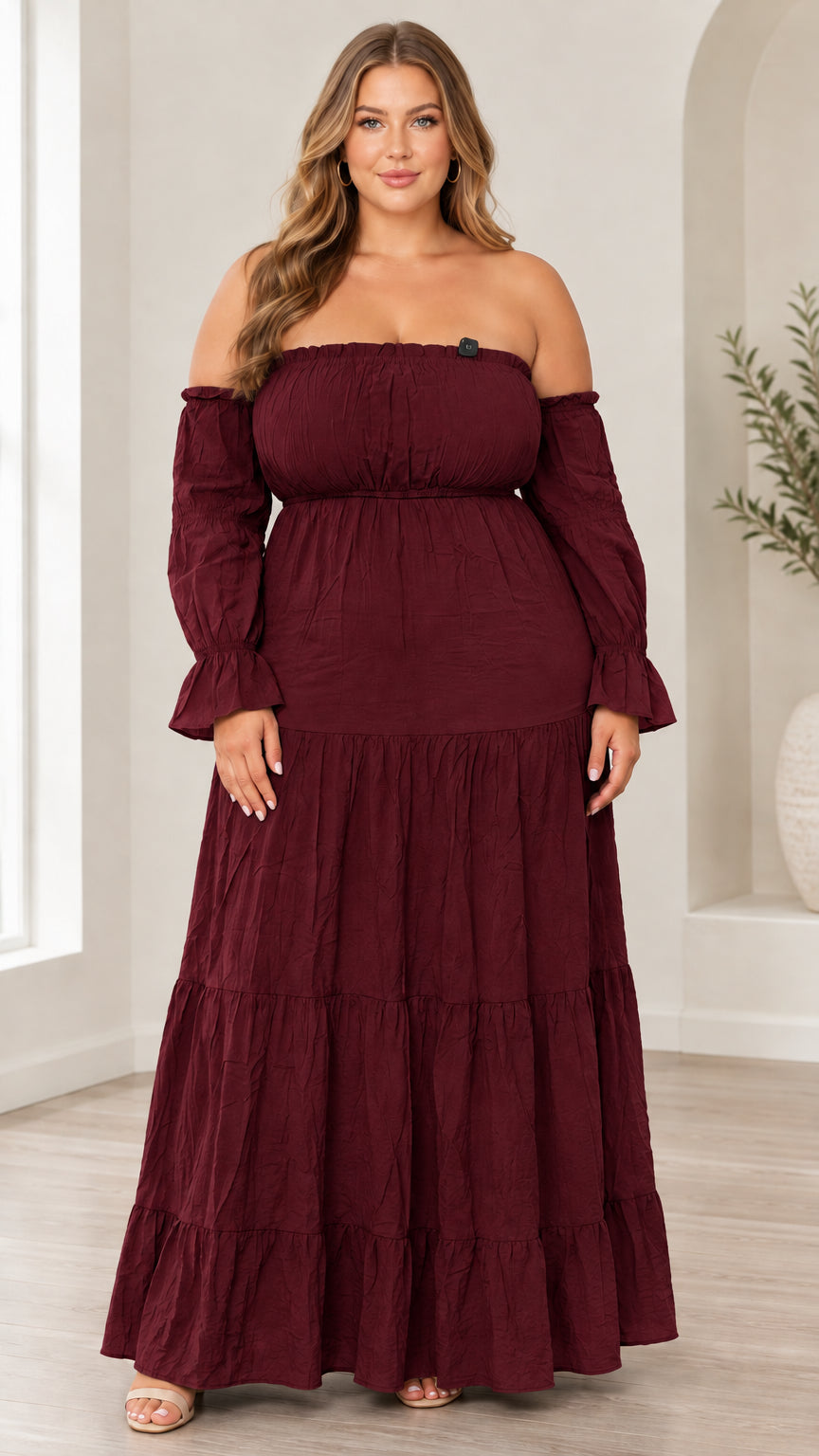 Front view of model wearing burgundy off-the-shoulder tiered maxi dress