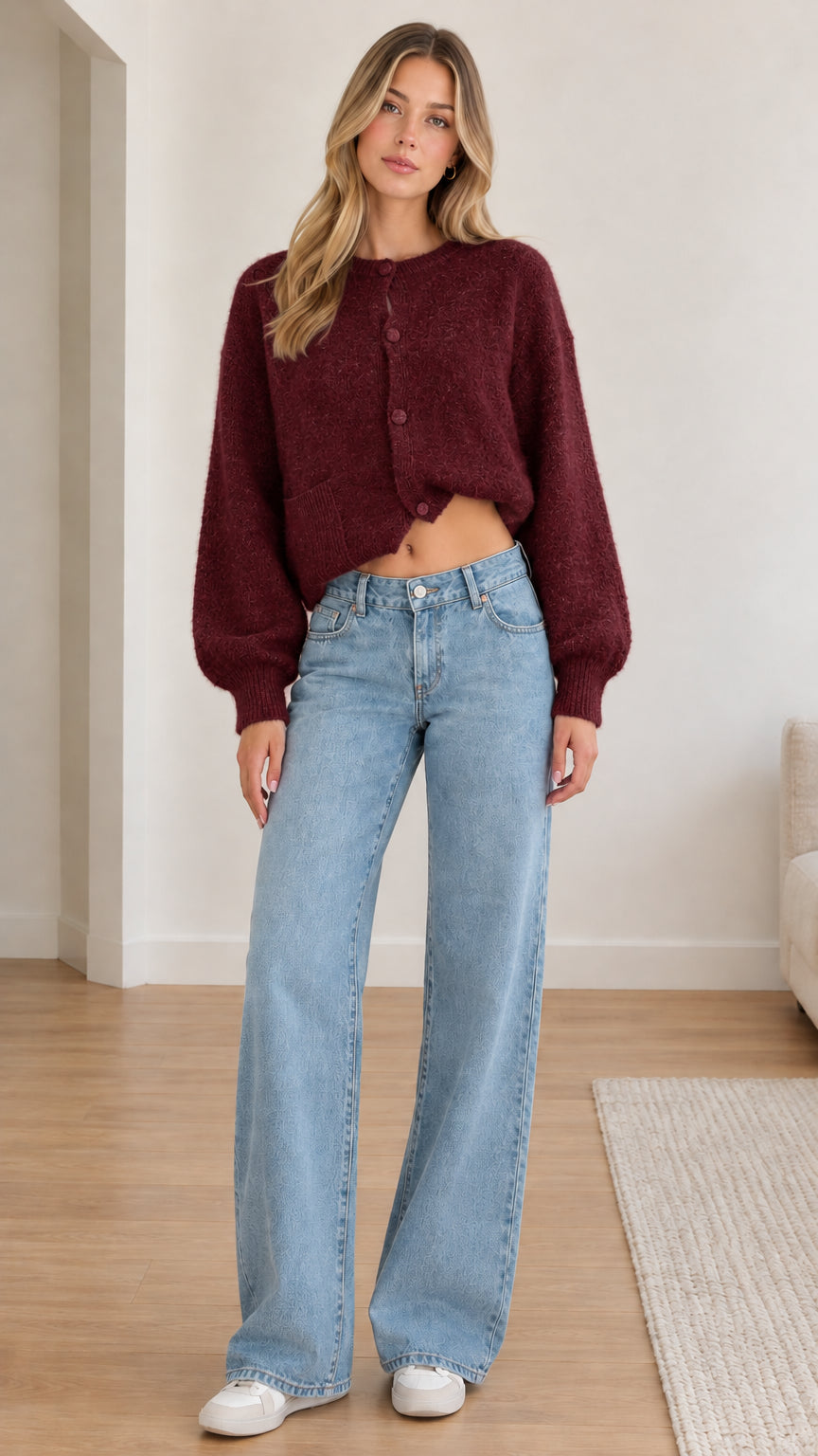 Front view of model wearing burgundy red fuzzy cropped cardigan sweater