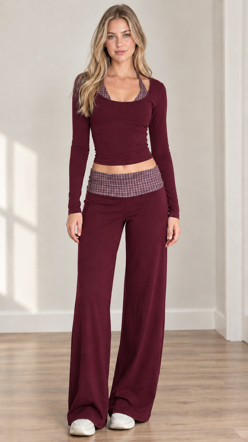 Front view of woman modeling burgundy long sleeve crop top and wide leg lounge pants