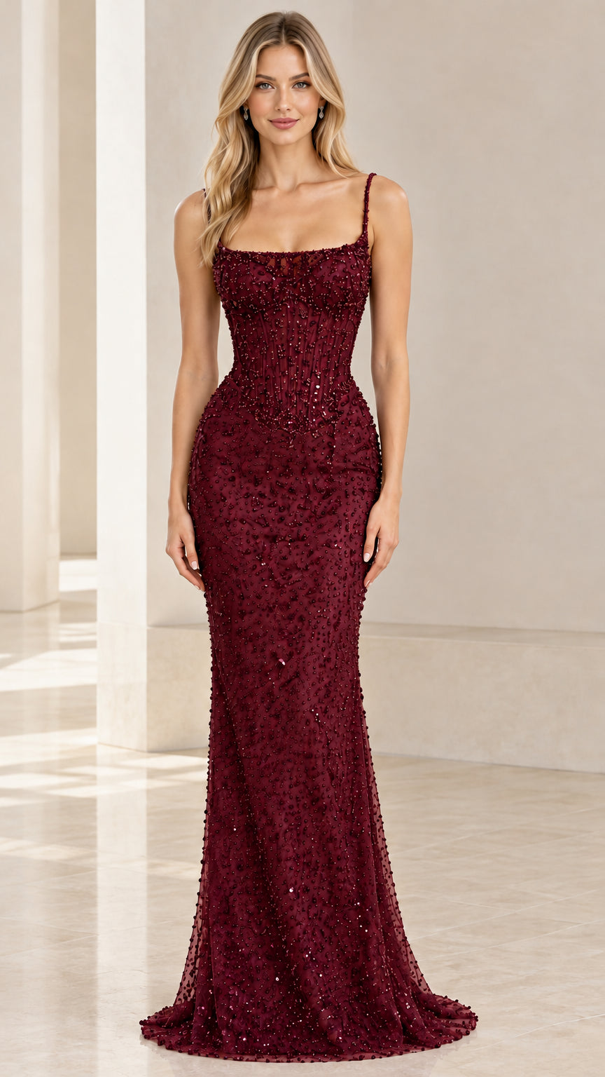 Front view of burgundy red beaded corset mermaid gown
