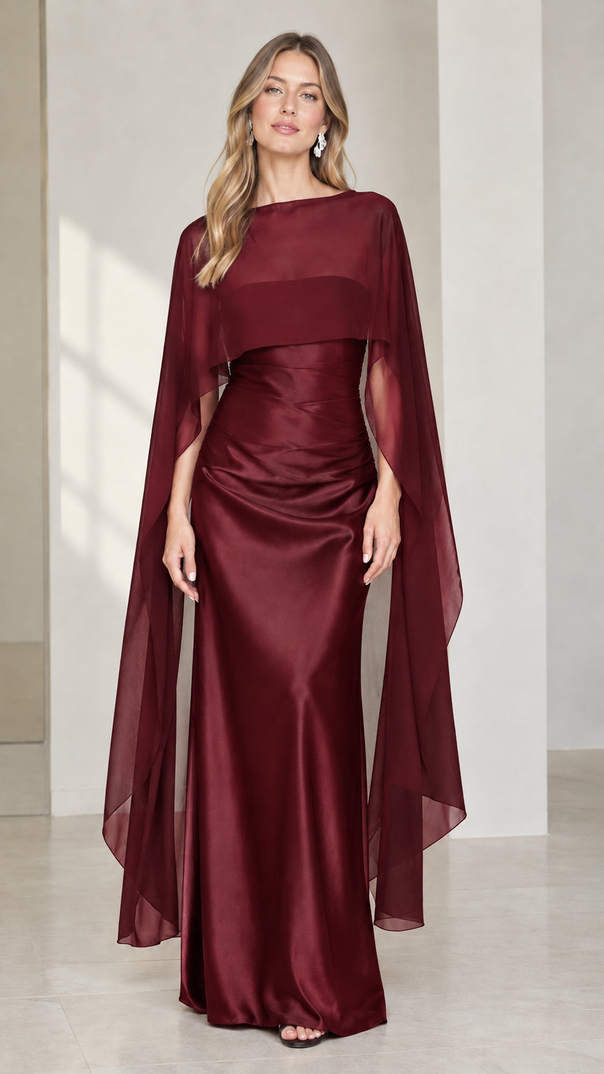 Full front view of burgundy wine satin evening dress with sheer capelet
