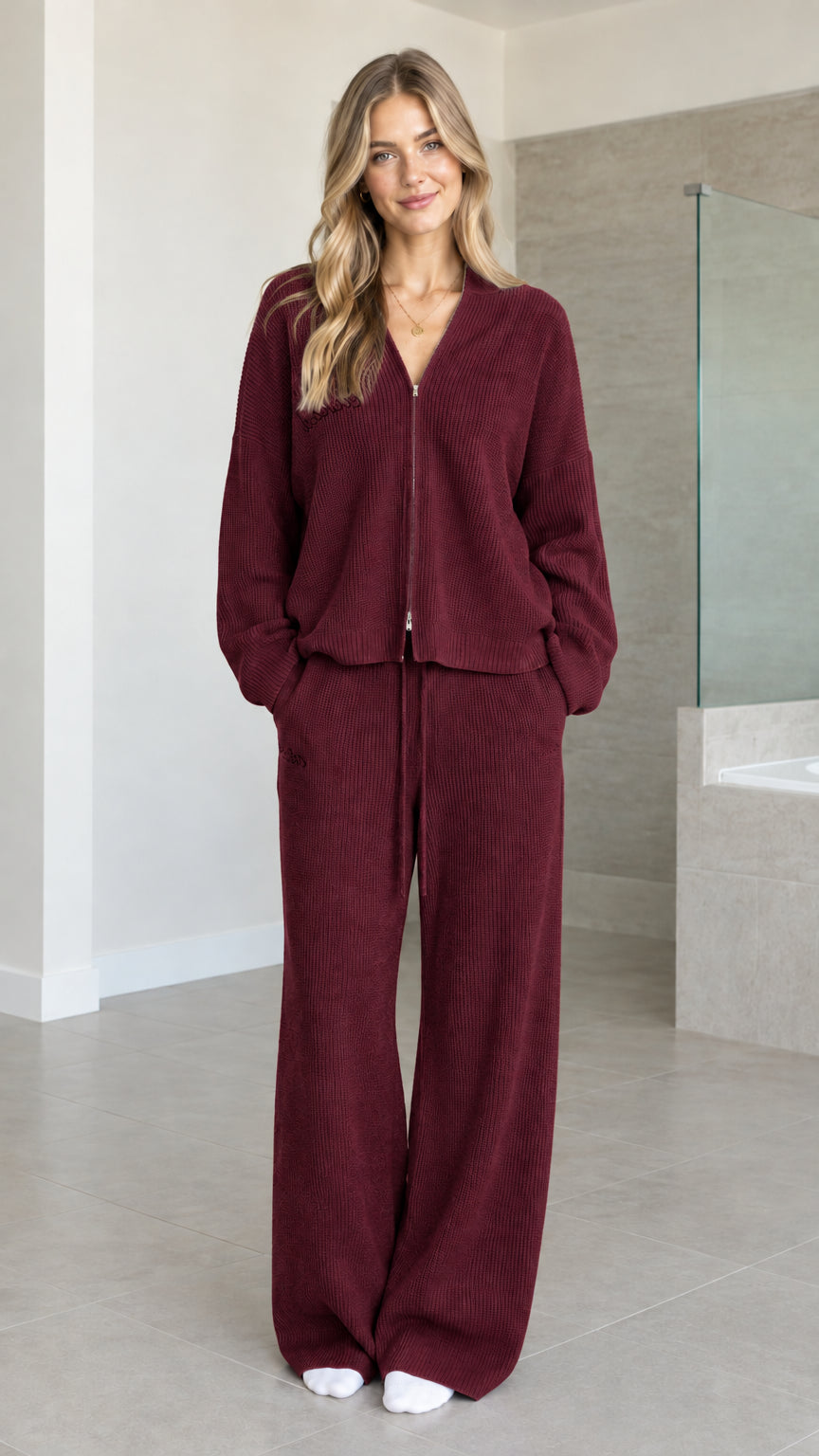 Front view of woman wearing Burgundy ribbed knit cardigan and wide-leg pants set