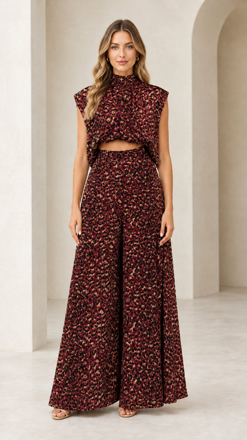 Front view of woman wearing burgundy wine leopard print mock neck top and wide-leg pants set