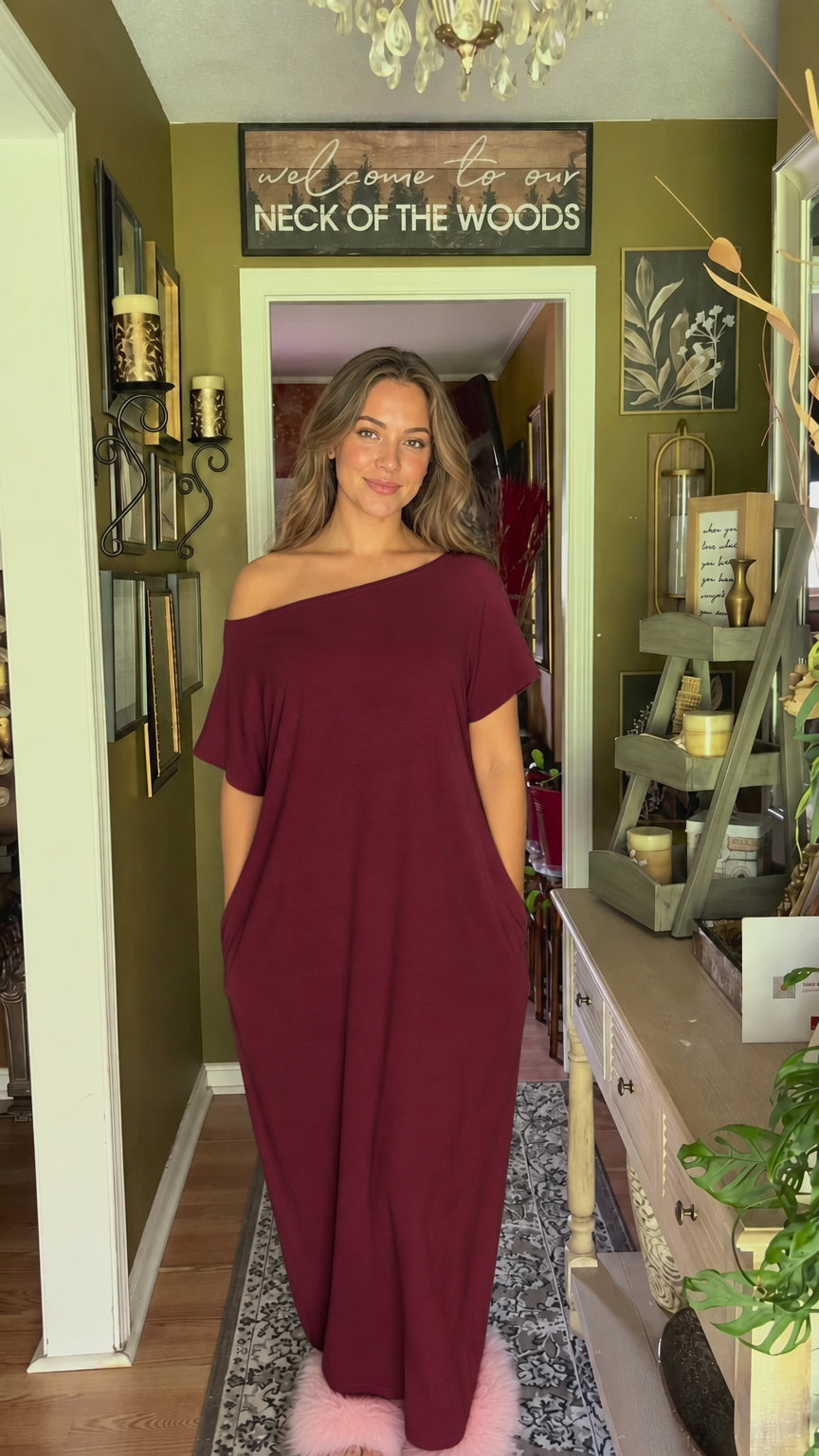 Front view of model wearing burgundy wine red one-shoulder maxi dress