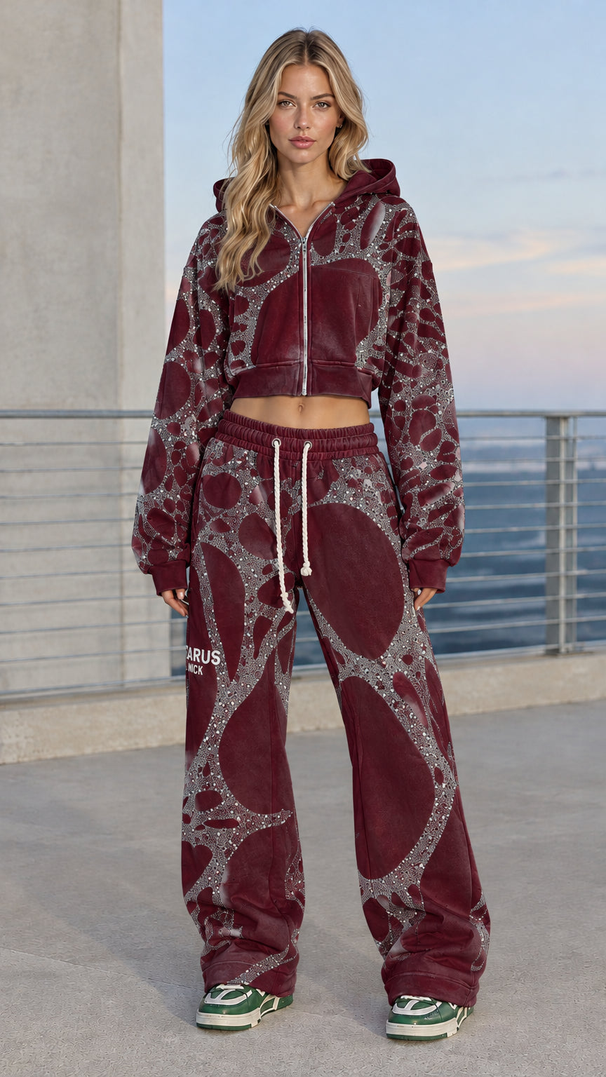 Front full view of woman wearing burgundy rhinestone cropped hoodie and wide leg sweatpants set