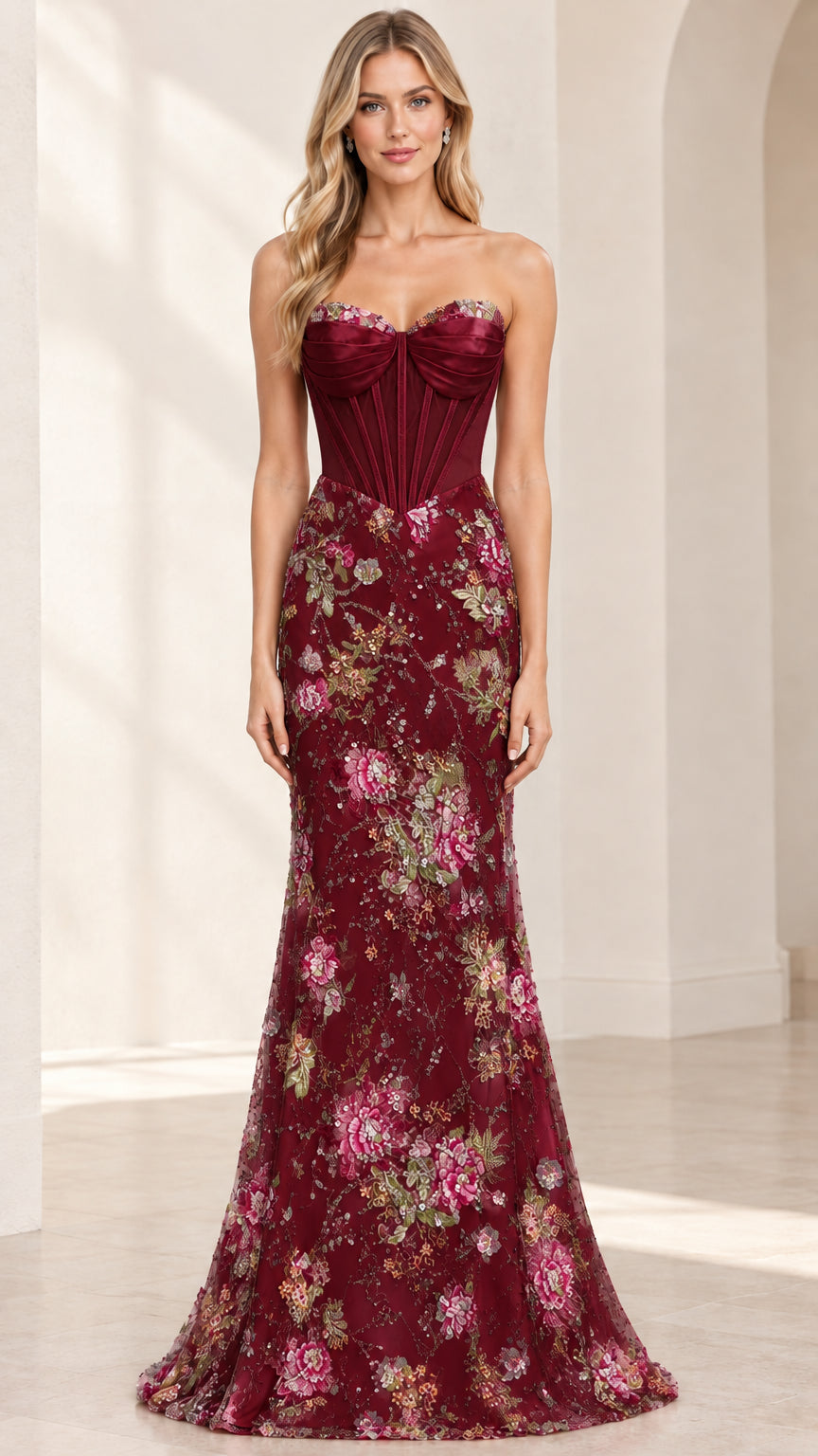 Front view of woman wearing burgundy wine red strapless corset floral evening gown