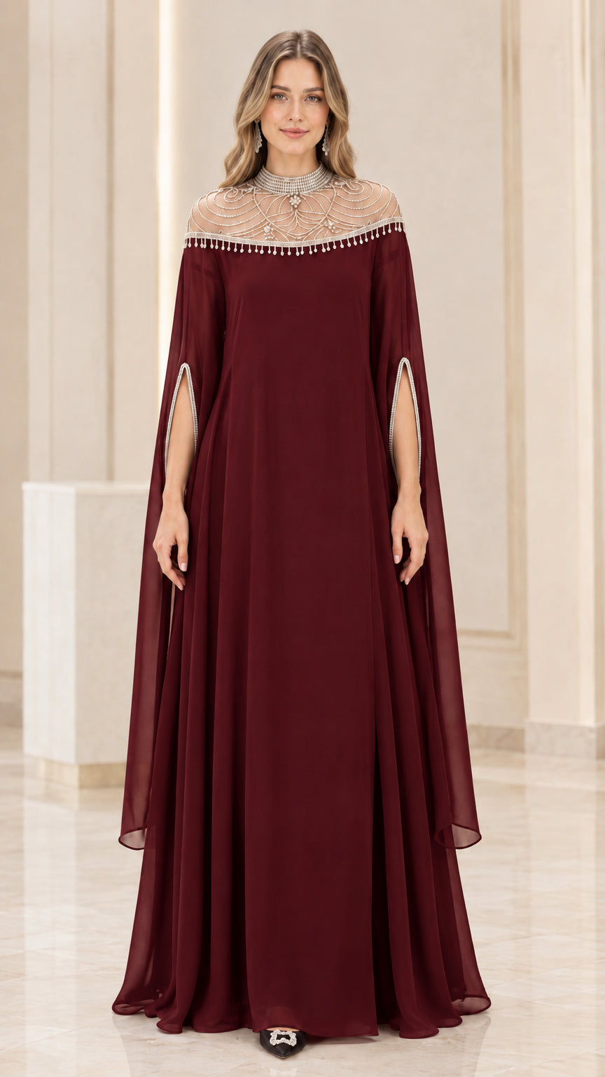 Front view of burgundy wine red beaded cape evening gown