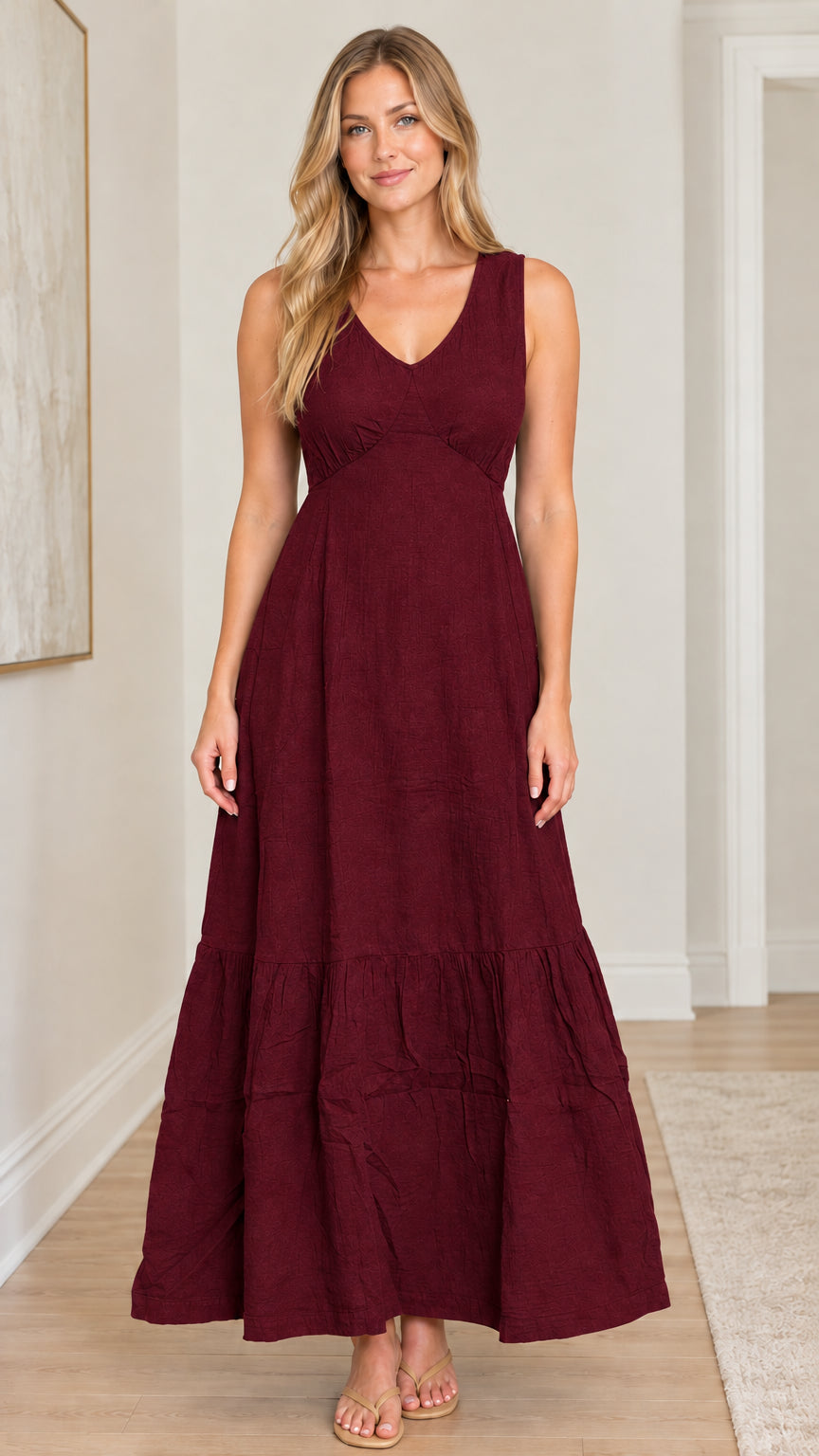 Front view of model wearing Burgundy sleeveless V-neck tiered maxi dress