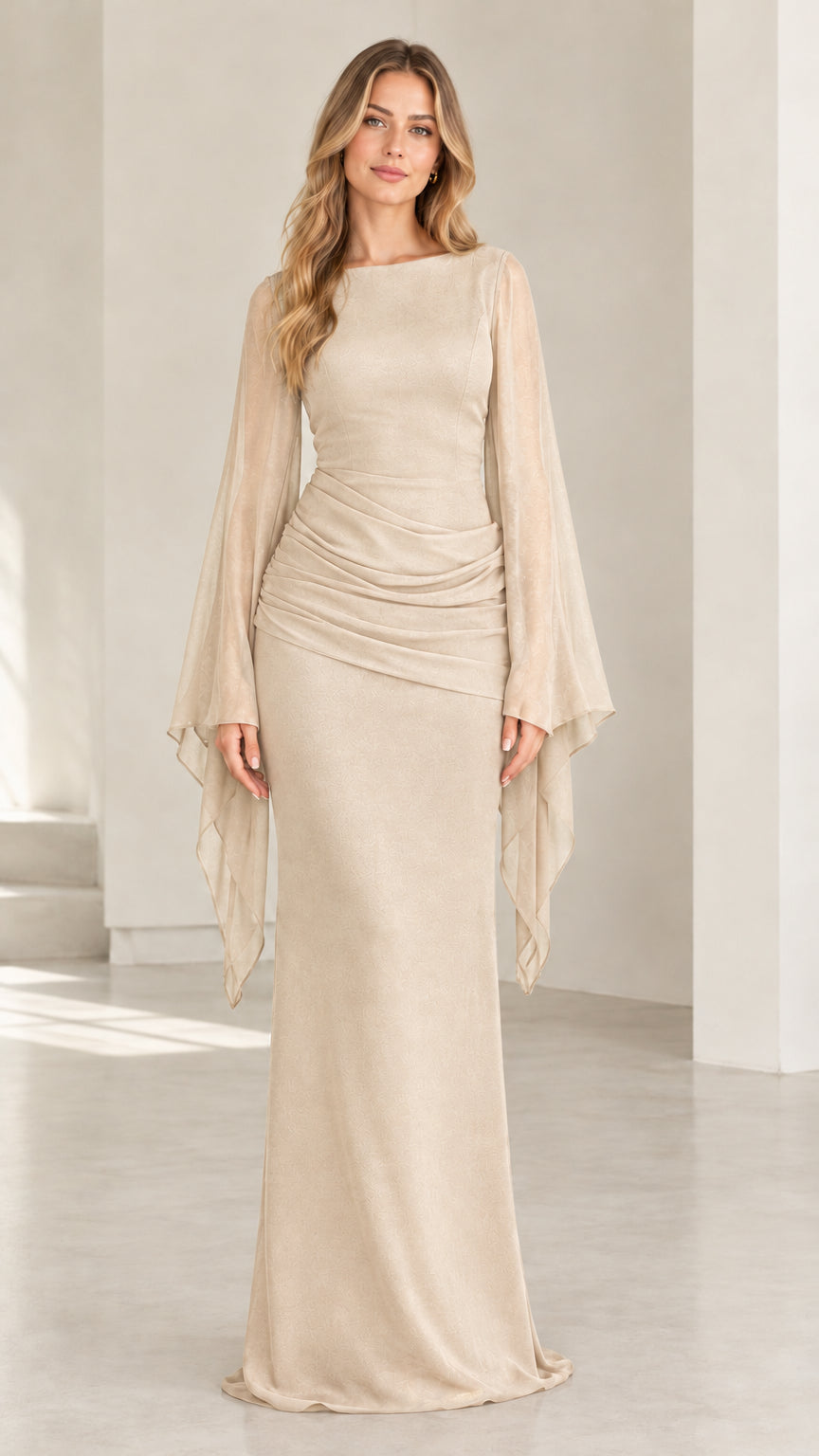 Model wearing champagne gold draped sleeve ruched formal evening gown