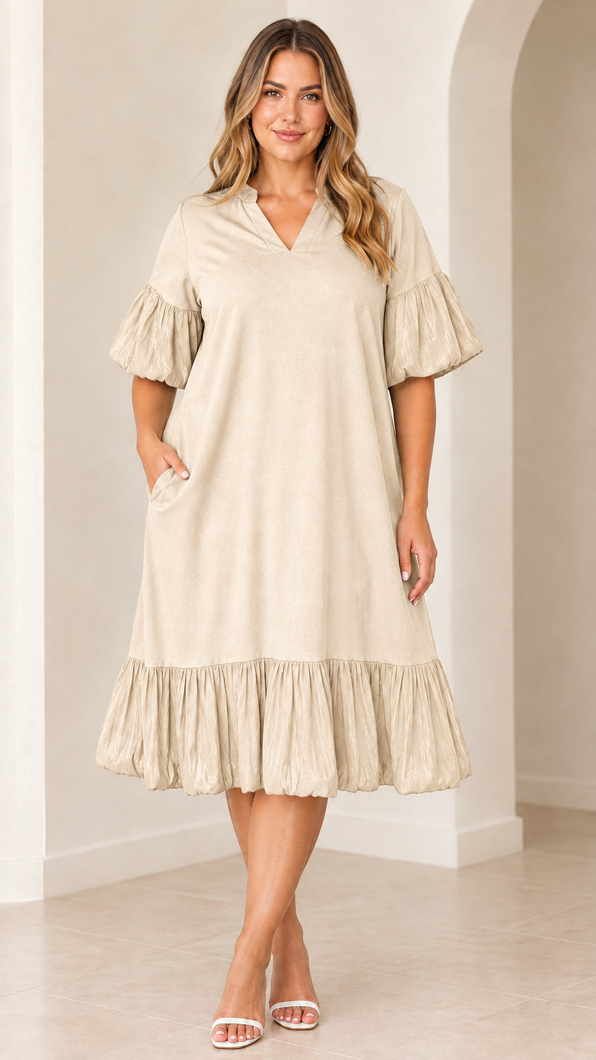 Model wearing beige V-neck flutter sleeve tiered midi dress