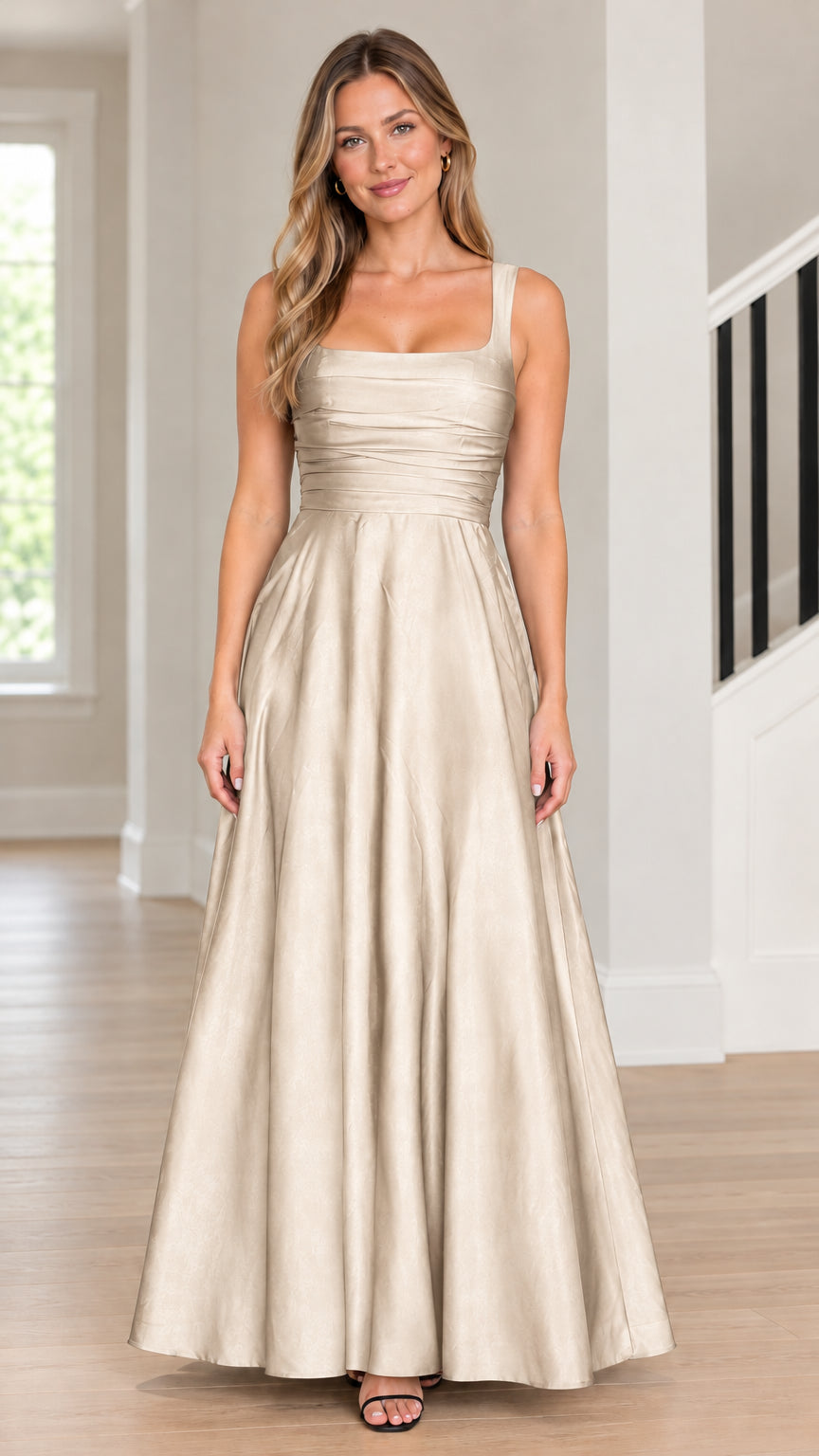Model wearing champagne gold square neck pleated bodice satin A-line maxi dress front view