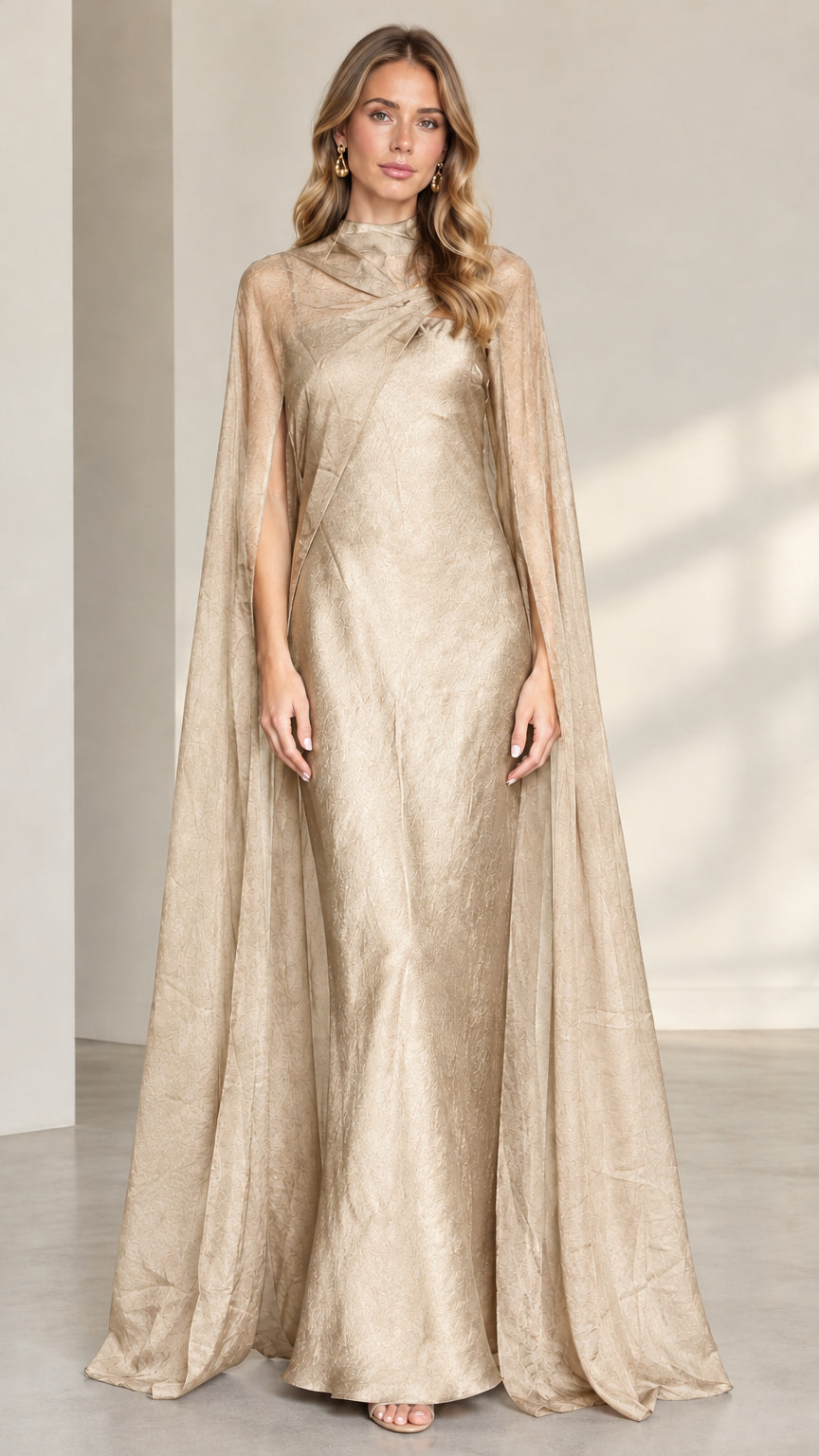 Champagne gold high neck maxi evening gown with sheer cape overlay