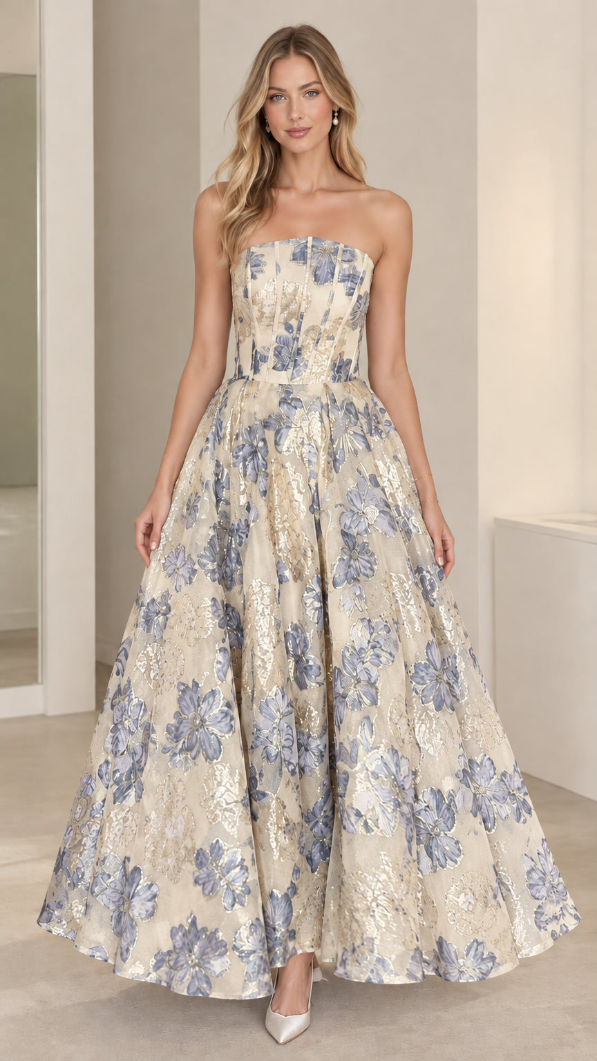 Full-length view of champagne and blue floral jacquard strapless formal gown