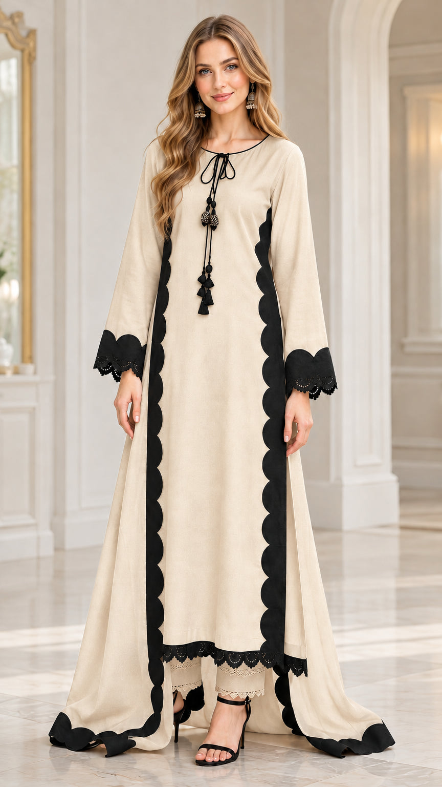 Front view of woman wearing cream off-white scallop trim tunic and pants set