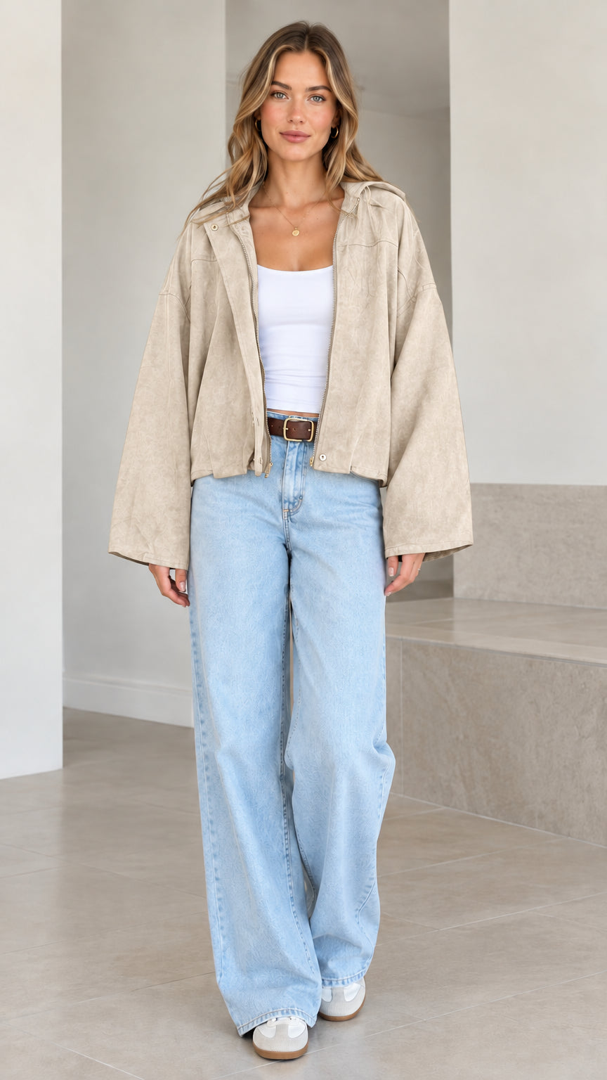 Model wearing beige neutral wide-sleeve cropped hooded casual jacket