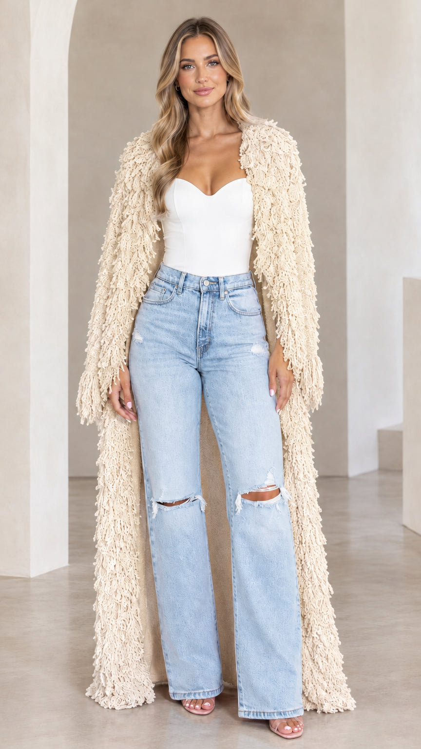 Front view of model wearing cream textured shaggy maxi duster cardigan